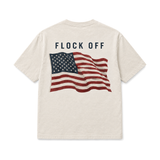 Flock Off Tee in natural, back: FLOCK OFF above a large full-color waving American flag